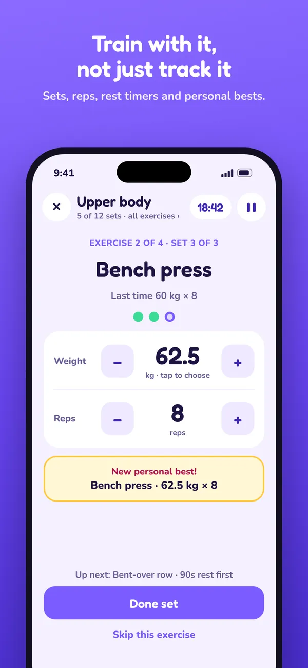 Fuelnauts workout screen with sets, reps, rest timers and personal bests